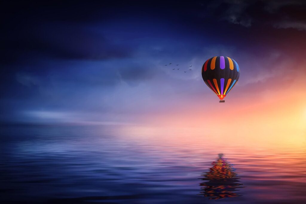 hot air balloon, lake, balloon, sunset, blue, yellow, colorful, sky, clouds, reflection, nature, floating, dream, fantasy, blue sky, blue sunset, blue clouds, blue fantasy, blue dream, blue lake, blue color